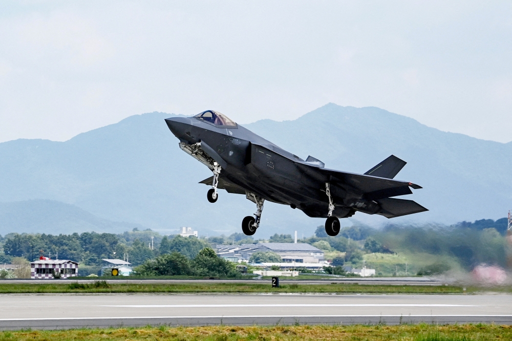 A South Korean Air Force F-35A fighter jet takes off during an air drill as part of the annual Ulchi Freedom Shield joint military exercise between South Korea and US in South Korea August 21, 2023. South Korea’s military said today it scrambled fighter jets as two Chinese and four Russian military planes entered its air defence zone, an area wider than the country’s airspace. ― Reuters pic/Defence Ministry handout