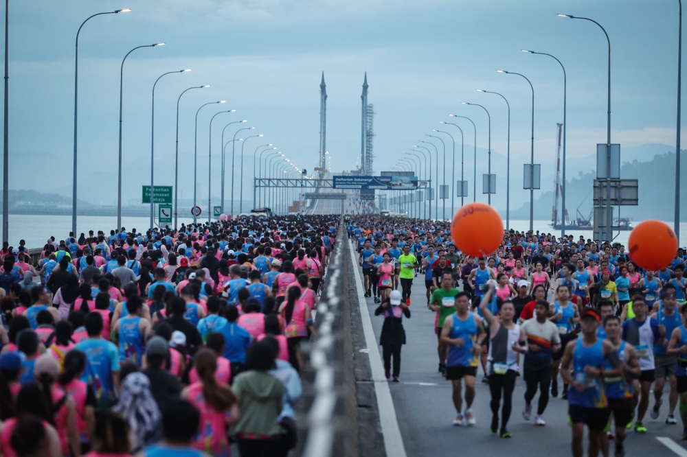 Participants take part in the Penang Bridge International Marathon in George Town in this file photo taken on December 11, 2022. There will be several road closures and diversions in Penang this Sunday in conjunction with the Penang Bridge International Marathon from Saturday (December 16) to Sunday (December 17). — Bernama pic