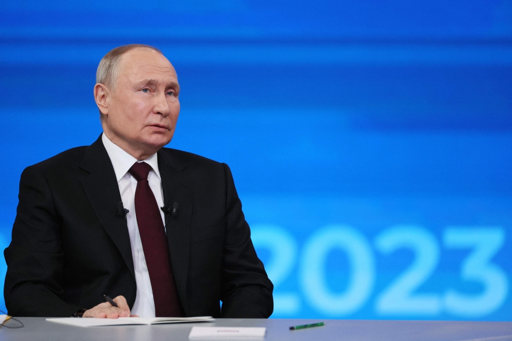 This pool photograph distributed by Russia's state agency Sputnik shows Russian President Vladimir Putin holding his year-end press conference at Gostiny Dvor exhibition hall in central Moscow on December 14, 2023. — Gavriil Grigorov/Pool/AFP pic 