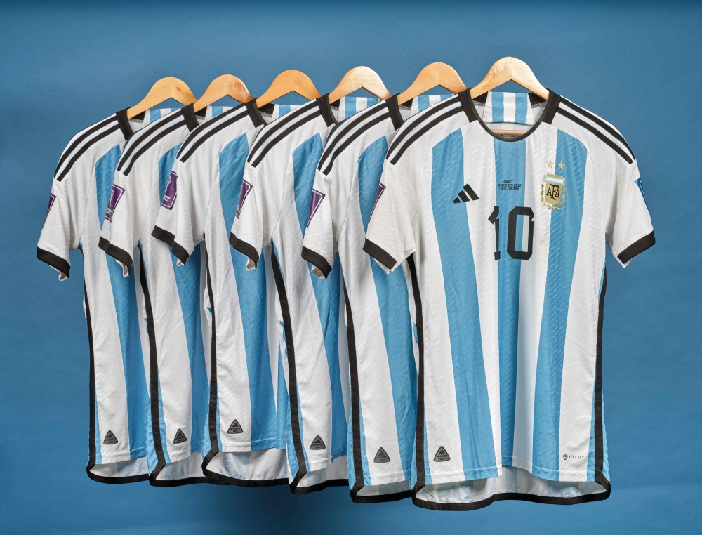 This undated photo courtesy of Sotheby's shows Lionel Messi's set of six match worn shirts from the 2022 FIFA World Cup. Six football shirts worn by Argentine megastar Lionel Messi at the 2022 World Cup in Qatar have sold for $7.8 million at auction, the auction house told AFP December 14, 2023. — Picture by Sotheby's via AFP