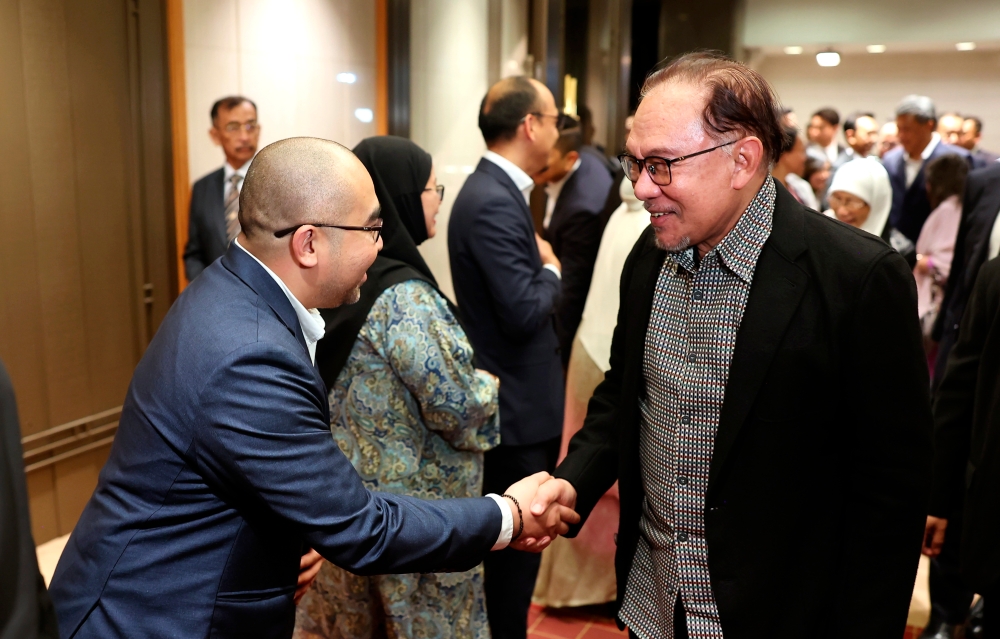 Prime Minister Datuk Seri Anwar Ibrahim and his wife Datuk Seri Dr Wan Azizah Wan Ismail arrived at the hotel for his working visit in conjunction with the Asean-Japan Commemorative Summit in Tokyo December 16, 2023. — Bernama pic
