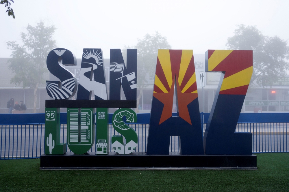 File photo of a sign reading San Luis, AZ, in the heavily Hispanic Yuma County, a Democratic stronghold in the southwestern corner of Arizona along the Mexico border, in San Luis, Arizona, US, November 17, 2023. — Reuters pic