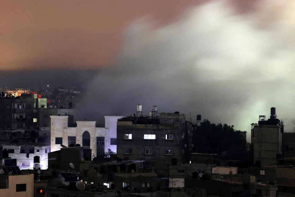 File photo of smoke billowing following an Israeli strike in Rafah in the southern Gaza Strip on December 8, 2023, amid ongoing fighting between Israel and Hamas in the Palestinian territory. ― AFP pic