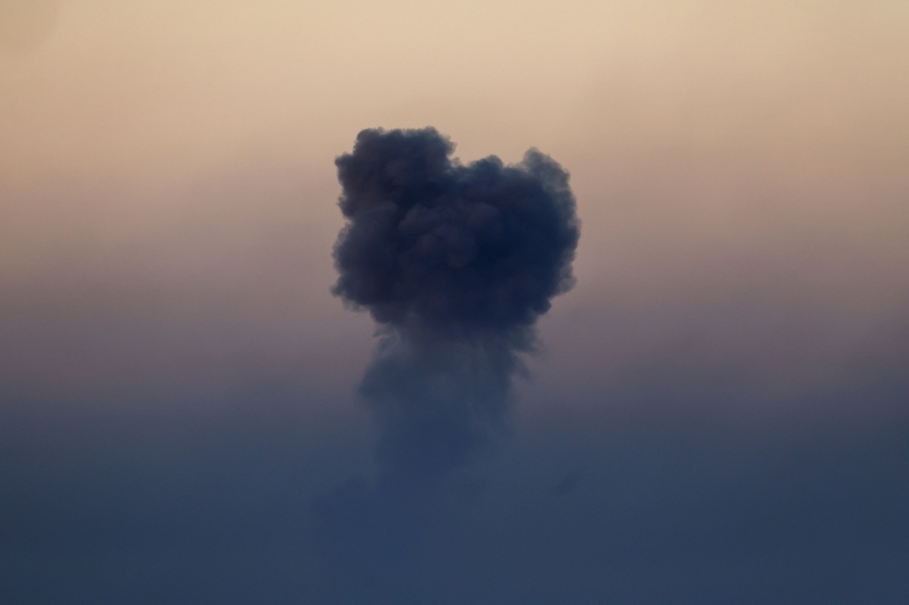 Smoke rises above Gaza, amid the ongoing conflict between Israel and the Palestinian Islamist group Hamas, as seen from Southern Israel, December 16, 2023. — Reuters pic  