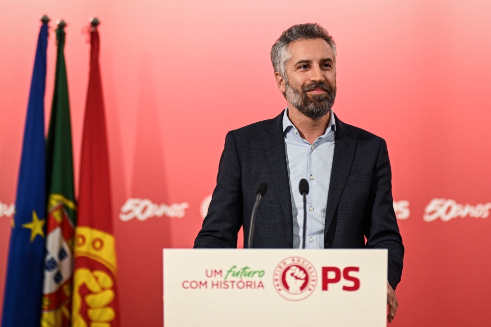 Newly elected Portuguese socialist party leader Pedro Nuno Santos smiles during his winning speech at the party headquarters in Lisbon on December 17, 2023. Pedro Nuno Santos will succeed outgoing Portuguese Prime Minister Antonio Costa, leading the socialist party for the upcoming legislative elections on March 10, 2024. — AFP pic