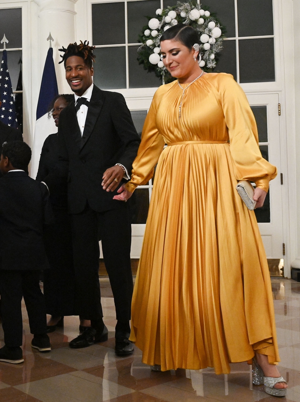 US singer Jon Batiste and his wife writer Suleika Jaouad arrive at the White House to attend a state dinner honoring French President Emmanuel Macron, in Washington, DC, on December 1, 2022. — AFP pic