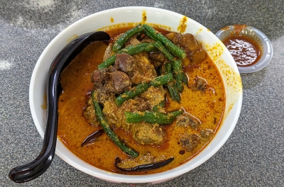 A satisfying bowl of curry mee awaits at Fei Poh Curry Mee Restaurant in Cheras