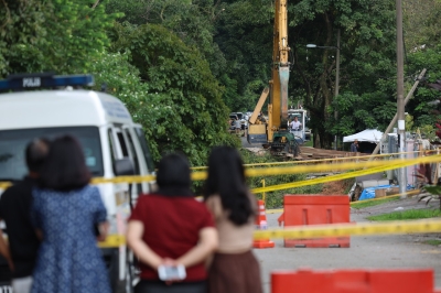 Landslide: Jalan Wawasan resident stunned to find huge crater in front of house