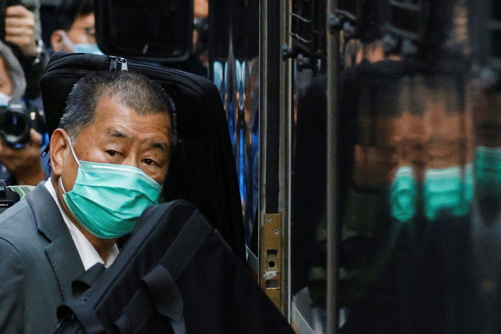 Media tycoon Jimmy Lai, founder of Apple Daily, looks on as he leaves the Court of Final Appeal by prison van, in Hong Kong February 1, 2021. — Reuters pic  