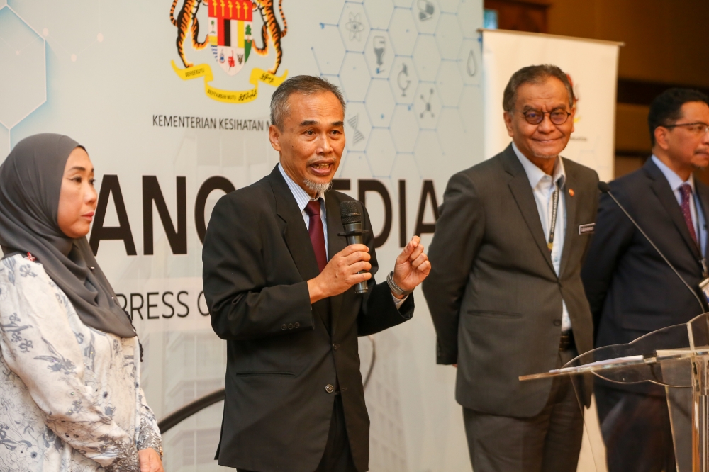 Director-General of Health Dr Muhammad Radzi Abu Hassan speaking at the press conference on Covid-19 in Malaysia at the Ministry of Health, Putrajaya, December 18, 2023. — Picture by Choo Choy May .