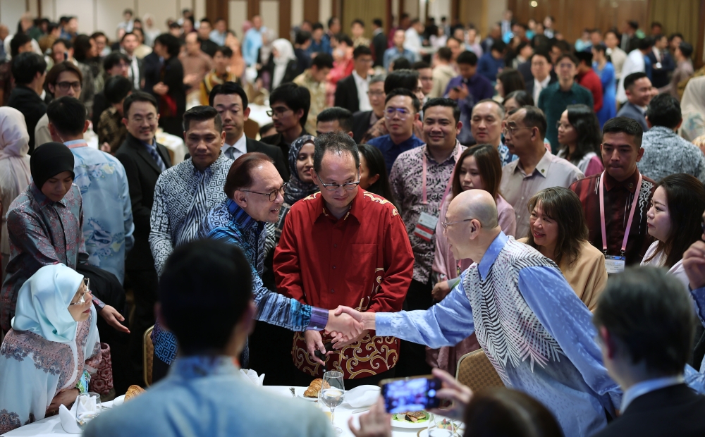 Prime Minister Datuk Seri Anwar Ibrahim and his wife Datuk Seri Dr Wan Azizah Wan Ismail attending the Malaysian diaspora high-tea event in Tokyo, Japan, December 18, 2023. — Bernama pic