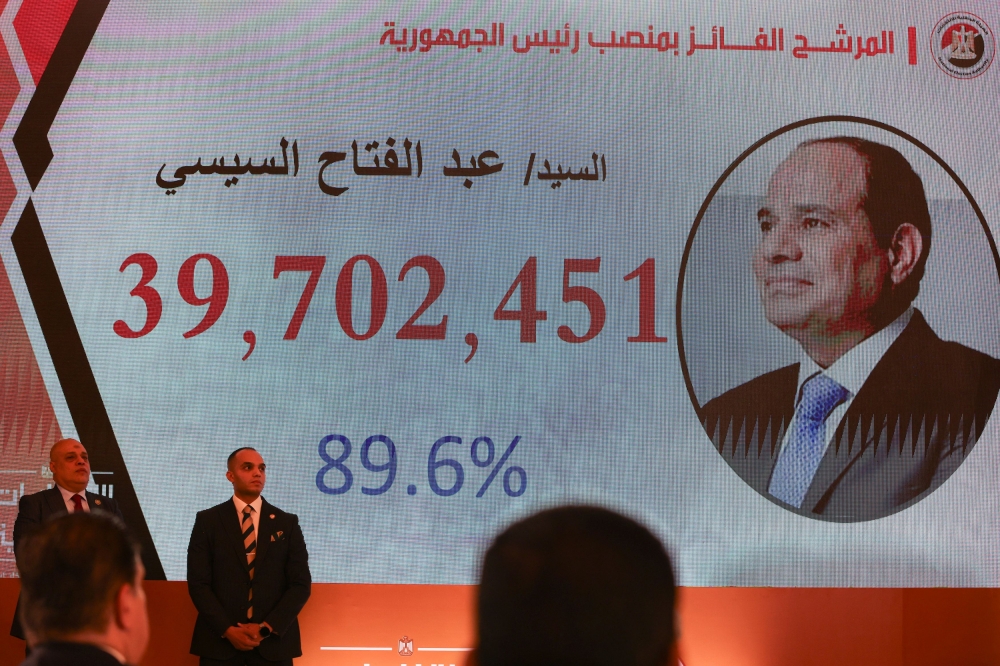 The image of Egyptian President Abdel Fattah al-Sisi is displayed during a press conference, announcing the results of the Egypt's presidential election, at the International Convention Center in Nasr City district in Cairo, Egypt, December 18, 2023. — Reuters pic