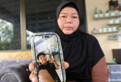Family of Ipoh cop hit-and-run victim urge social media users to delete crash video