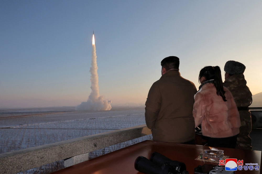 North Korean leader Kim Jong-un views the launch of a Hwasong-18 intercontinental ballistic missile during what North Korea says is a drill at an unknown location December 18, 2023 in this picture released by the Korean Central News Agency. ― KCNA via Reuters