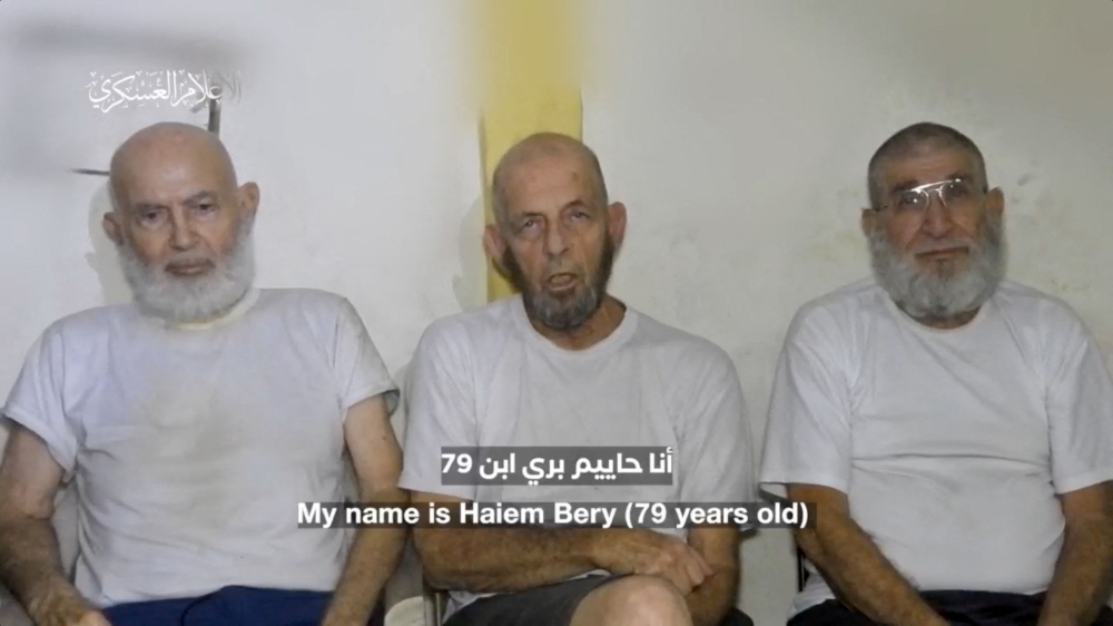 Three Israeli hostages appear in footage by Palestinian group Hamas at a location given as Gaza, in this still image obtained from handout video released December 18, 2023. ― Hamas Military Wing/Handout via Reuters