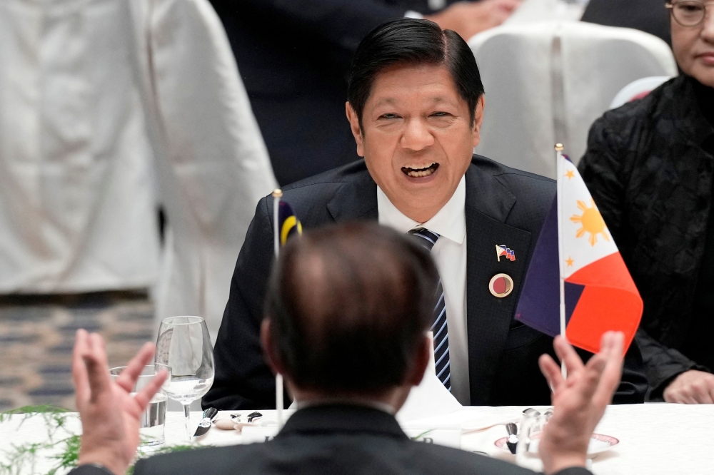 Philippines' President Ferdinand Marcos Jr. attends the 50th anniversary of Asean-Japan Friendship and Cooperation luncheon meeting at Keidanren (Japan Business Federation) in Tokyo December 18, 2023. ― Eugene Hoshiko/Pool via Reuters