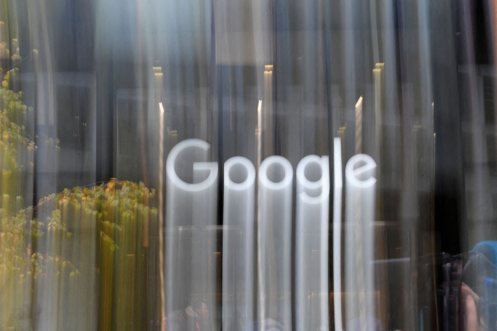 Google was accused of overcharging consumers through unlawful restrictions on the distribution of apps on Android devices and unnecessary fees for in-app transactions. It did not admit wrongdoing. — Reuters pic
