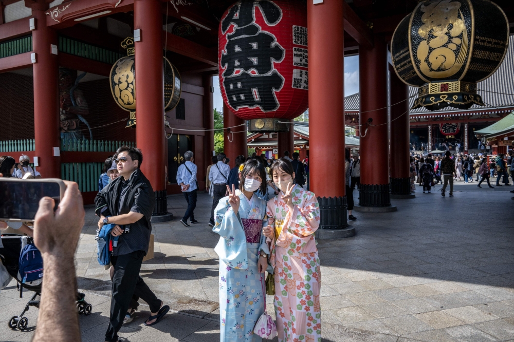 Japan ended some of the world's most stringent Covid-19 border restrictions late last year, and tourism has picked up so far this year, with the number of visitors rising in October to above pre-pandemic levels. ― AFP pic