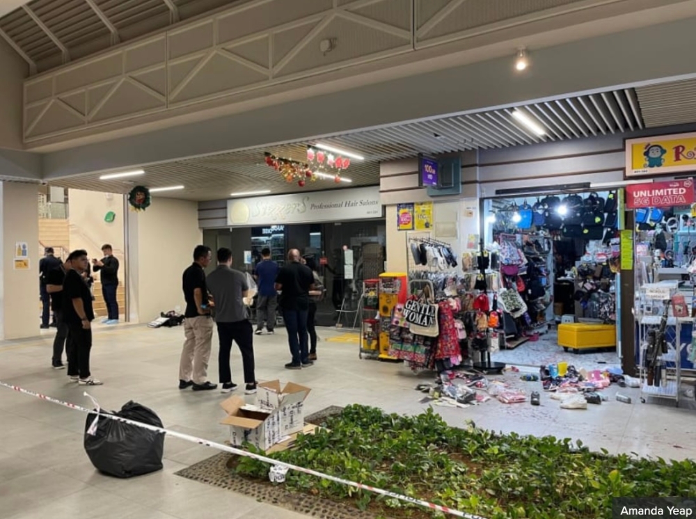 Aftermath of the slashing incident at Block 734 Pasir Ris Street 72. — Picture by Amanda Yeap via TODAY