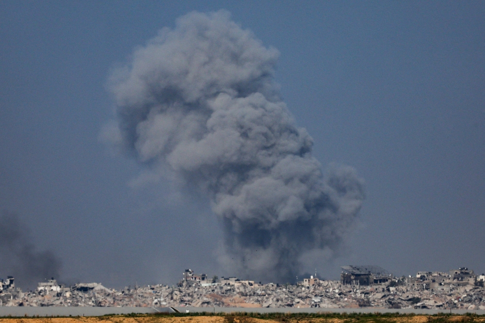 Smoke rises in the Gaza Strip, amid the ongoing conflict between Israel and the Palestinian Islamist group Hamas, as seen from southern Israel, December 20, 2023. — Reuters pic