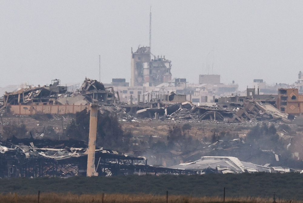 Destroyed buildings lie in ruin in the Gaza Strip, amid the ongoing conflict between Israel and the Palestinian Islamist group Hamas, as seen from southern Israel, December 21, 2023. — Reuters pic