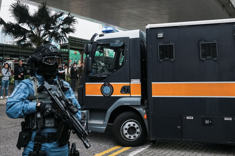 A prison van that is believed to carry media mogul Jimmy Lai, founder of Apple Daily, leaves the West Kowloon Magistrates' Courts on the day of the national security trial, in Hong Kong December 18, 2023. ― Reuters pic