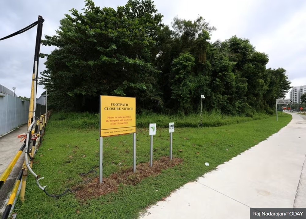 Signage detailing the closure of a footpath near the site of a new public housing project near Pasir Ris Park. — TODAY pic 