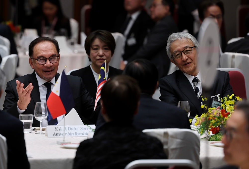 File picture shows Prime Minister Datuk Seri Anwar Ibrahim attending the 50th year of Asean-Japan friendship and cooperation luncheon meeting with leaders of Asean Countries hosted by Japan Business Federation (Keidanren) and Japan Chamber of Commerce and Industry in Tokyo, December 18, 2023. — Bernama pic