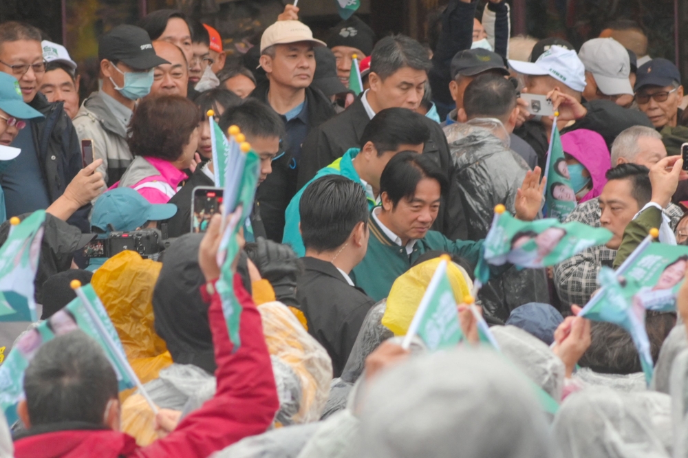 File photo of Taiwan’s ruling Democratic Progressive Party (DPP) presidential candidate Lai Ching-te (centre) greeting supporters during a campaign rally ahead of the January 2024 presidential election in Yilan county on December 21, 2023. ― AFP pic