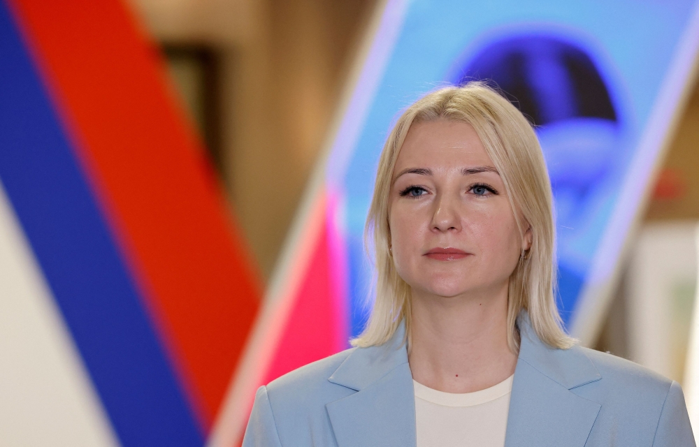 File photo of Yekaterina Duntsova, a former regional journalist who plans to run for Russian president in the March 2024 election, speaking with journalists after meeting officials of the Central Election Commission to submit documents at an office in Moscow, Russia, December 20, 2023. ― Reuters pic