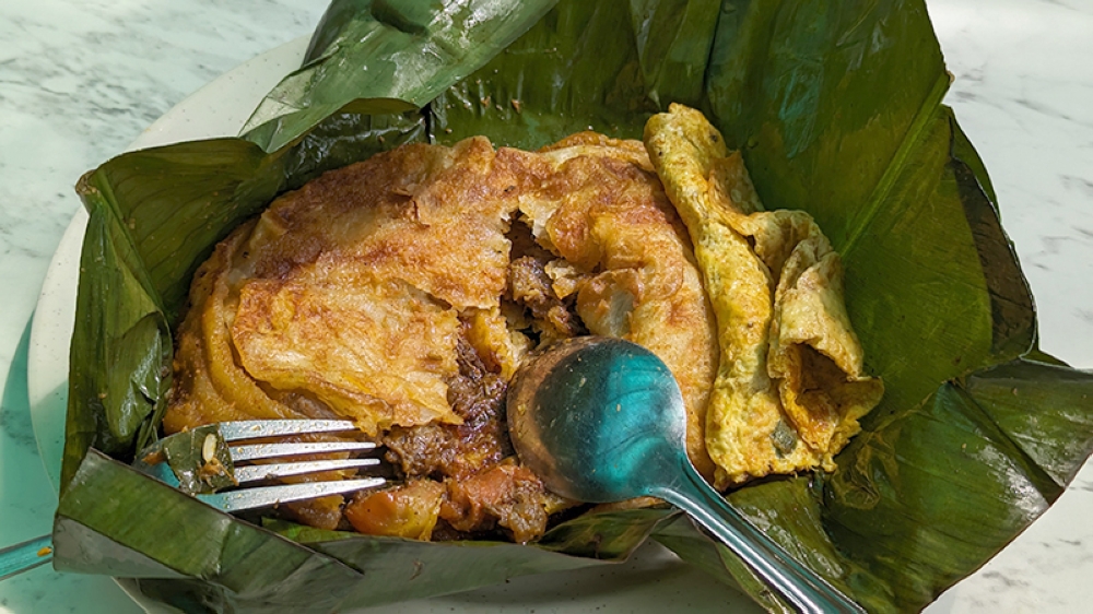 'Kizhi parotta' was filled with moreish mutton.