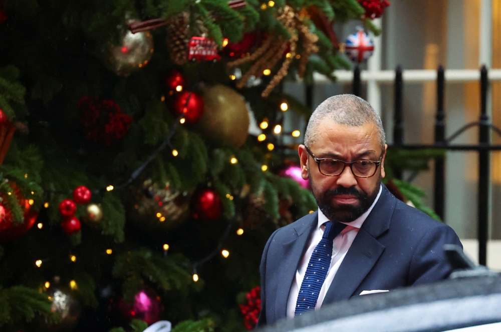 British Home Secretary James Cleverly walks outside 10 Downing Street in London, Britain, December 19, 2023. — Reuters pic
