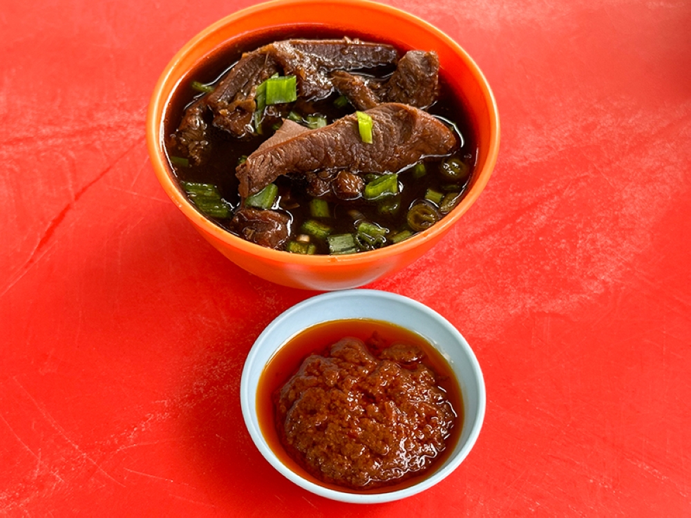 You can add on a bowl of beef tripe and add the mildly spicy 'sambal'