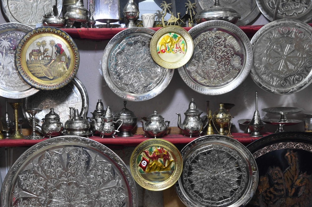Engraved plates are displayed at a shop in the souks of the medina of Tunis on December 7, 2023. — AFP pic 