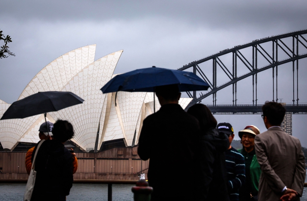 Sydney was battered by heavy rains and flash floods on Christmas eve. — AFP pic