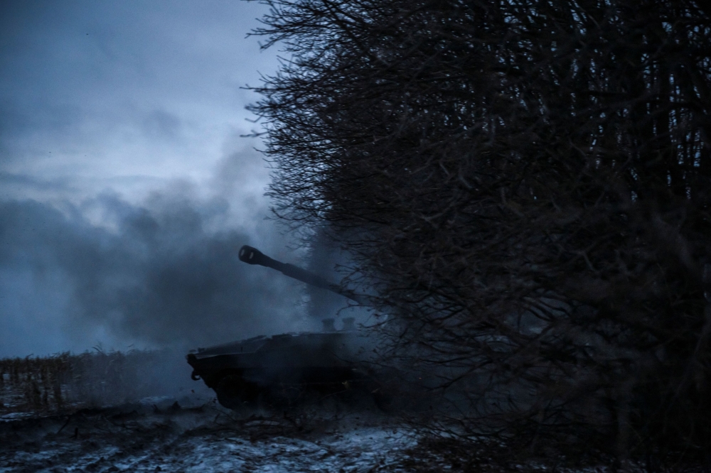 Ukrainian service members of the 4th Ivan Vyhovskyi Separate Tank Brigade fire a 2S1 Gvozdika self-propelled howitzer toward Russian troops near the front line town of Kupiansk, amid Russia's attack on Ukraine, on a Christmas Eve in Kharkiv region, Ukraine December 24, 2023. — Reuters pic
