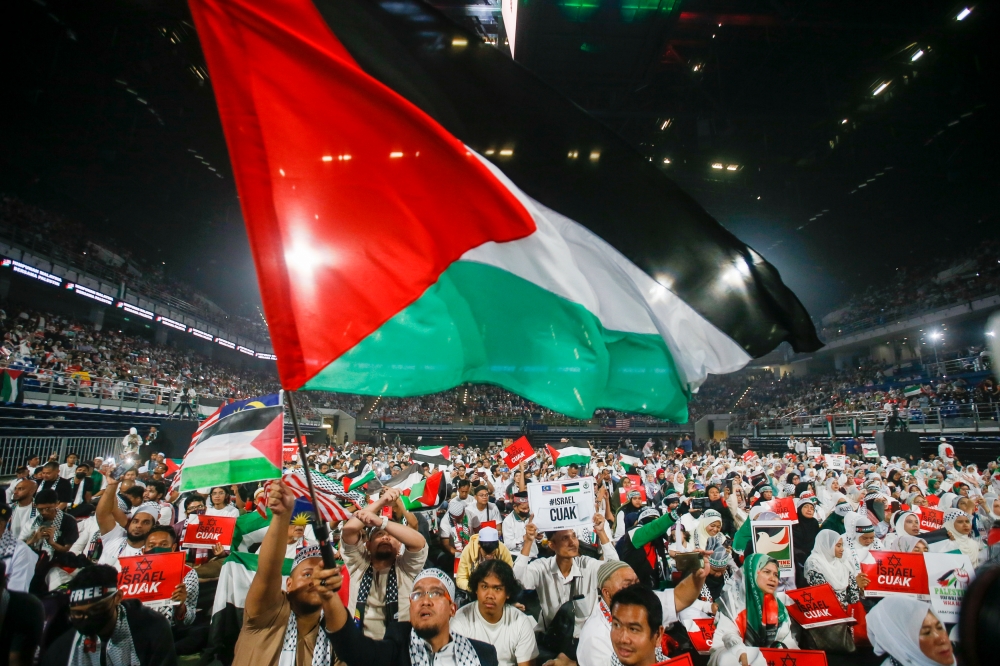 People attends the Solidarity with Palestine rally in the wake of the conflict between Israel and Hamas in the Gaza at Axiata Arena, Bukit Jalil October 24, 2023. — Picture by Hari Anggara.