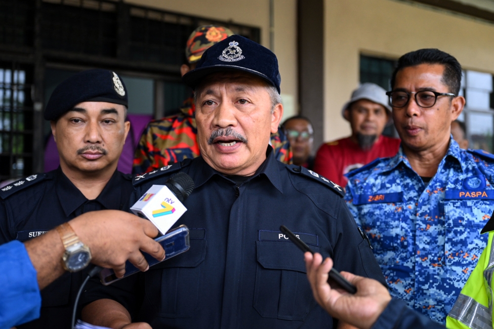 Terengganu deputy police chief Datuk Wan Rukman Wan Hassan speaks to the media after visiting a temporary evacuation centre in Kampung Bukit Tok Bat in Kuala Berang December 26, 2023. — Bernama pic