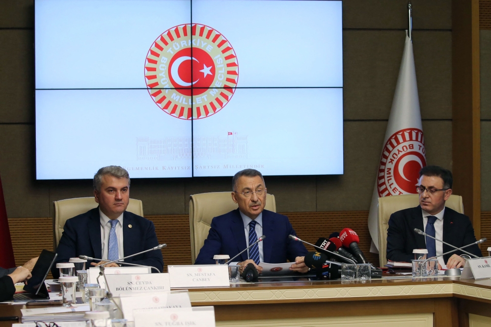 Grand National Assembly of Turkey (TBMM)'s Foreign Affairs Committee's Fuat Oktay (centre) chairs a committee session at the TBMM in Ankara on December 26, 2023. The key committee in the Turkish parliament gave the greenlight for Sweden's Nato membership. — AFP pic