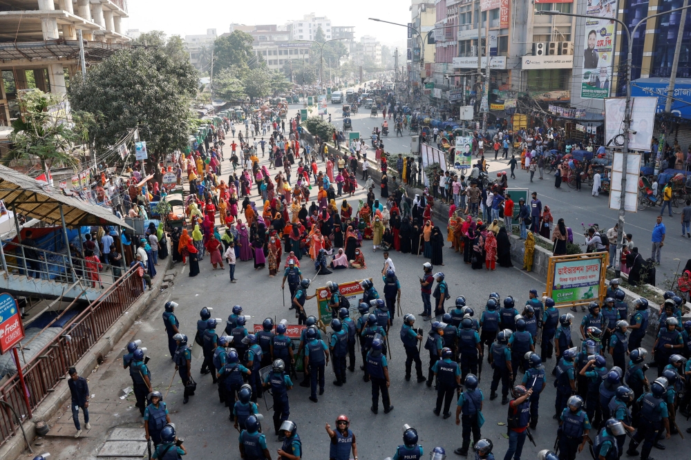 Clashes during the protests, which ran alongside wider anti-government demonstrations by the opposition ahead of the Jan. 7 general election, killed four workers and injured dozens of others, with the police filing cases against hundreds of unidentified people for vandalism. — Reuters file pic