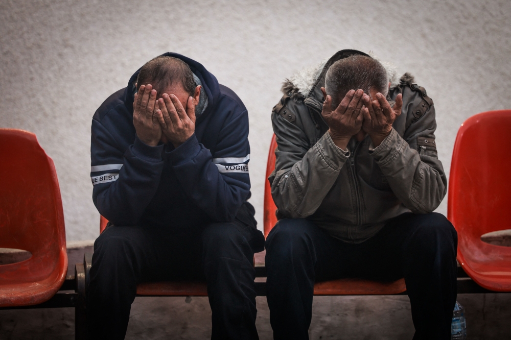 People mourn loved ones killed in Rafah during Israeli bombardment on the southern Gaza strip, at Al-Najar hospital on December 29, 2023, amid continuing battles between Israel and Hamas. — AFP pic