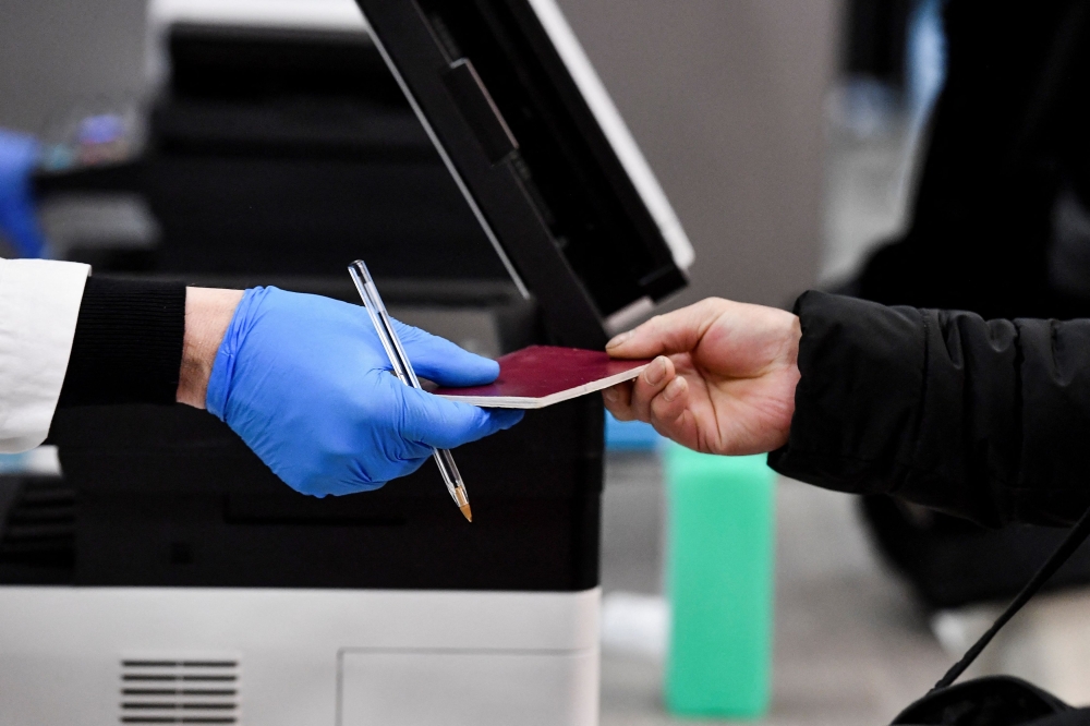 Citizens of European Union members Romania and Bulgaria will no longer need a passport from March 31, 2024 to travel by air or sea to most other EU countries as well as Norway and Switzerland, the council of EU governments said yesterday. — Reuters pic