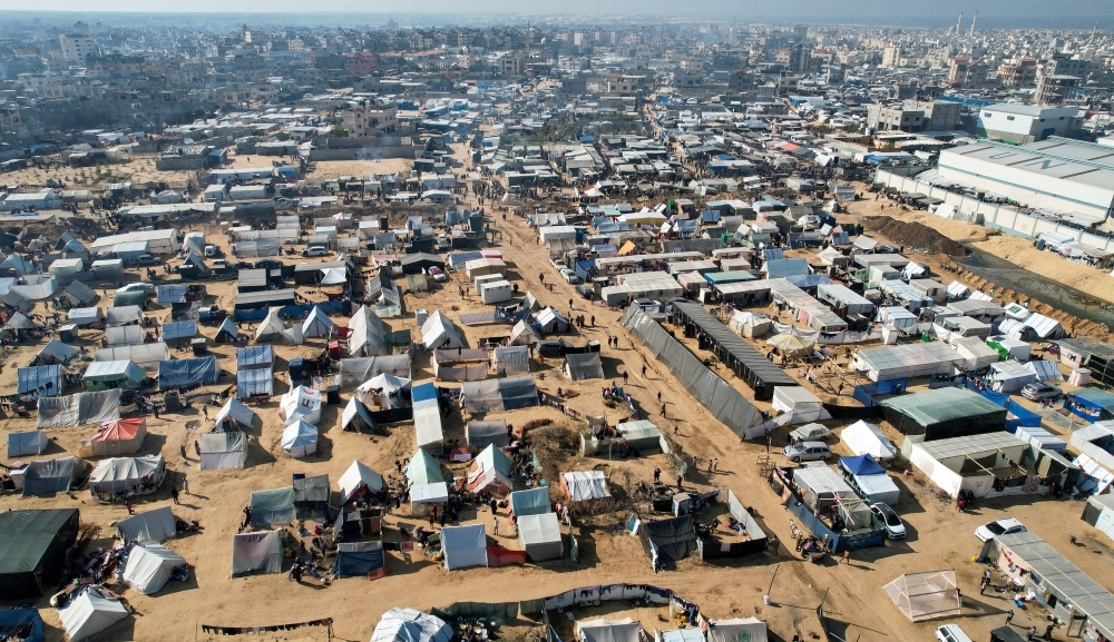 Displaced Palestinians, who fled their homes due to Israeli strikes, shelter in a tent camp, amid the ongoing conflict between Israel and the Palestinian Islamist group Hamas, in Rafah, southern Gaza Strip, December 29, 2023. — Reuters pic
