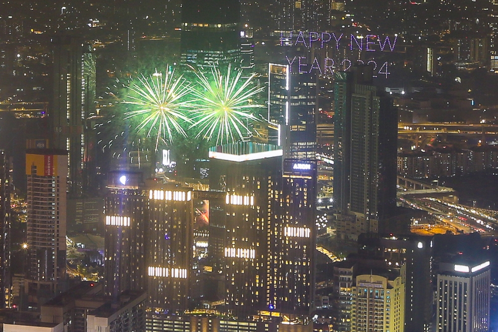 Fireworks usher in the new year the Tun Razak Exchange in Kuala Lumpur January 1, 2024. — Picture by Yusof Mat Isa