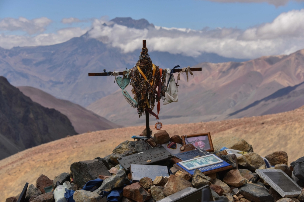 Picture of the cross on the grave of the victims of the Andes flight disaster of 1972, in the Valley of the Tears in the remote Andes Mountains in the Argentine province of Mendoza, on the border with Chile, taken on February 3, 2023. — AFP pic
