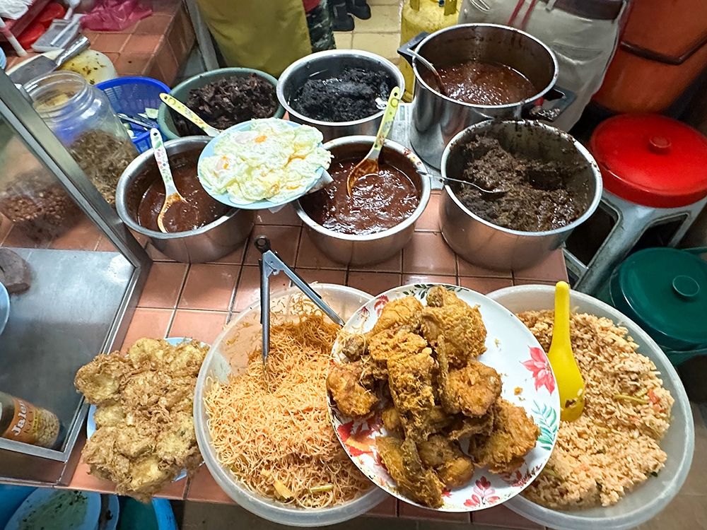 The spread for 'nasi lemak' is kept simple so each of the 