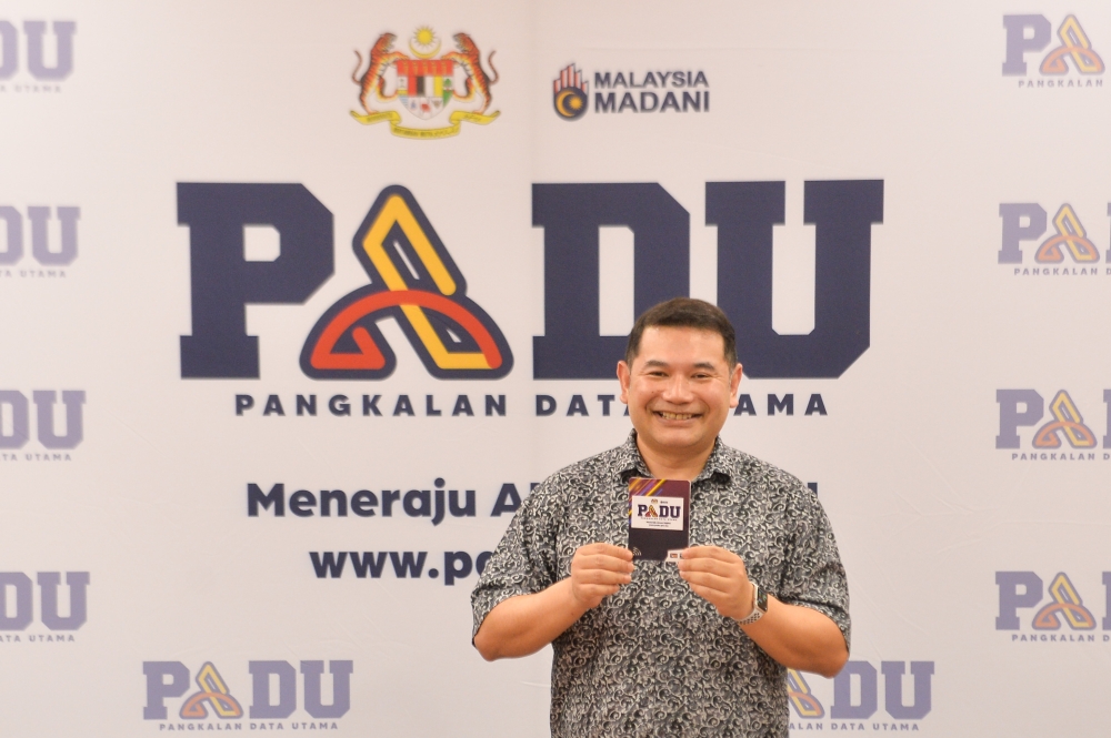 Minister of Economy Rafizi Ramli has assured the public that existing laws of the respective government departments or agencies govern all data that Padu uses. — Picture by Miera Zulyana