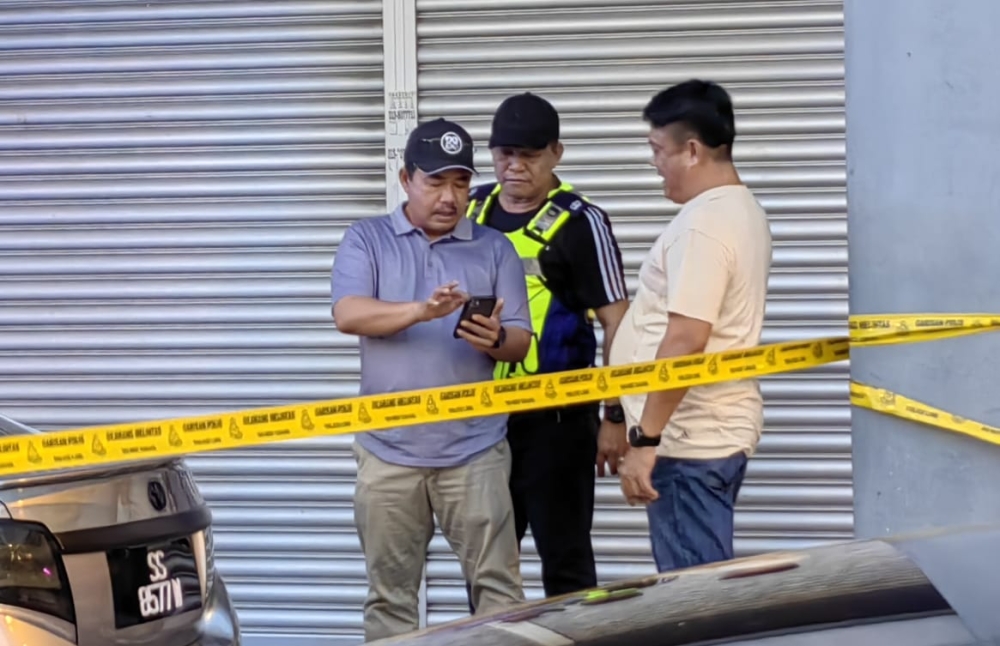 Sibu police chief ACP Zulkipli Suhaili at the scene of the shooting, at Jalan Wong King Huo in Sibu January 1, 2023. — Borneo Post Online pic