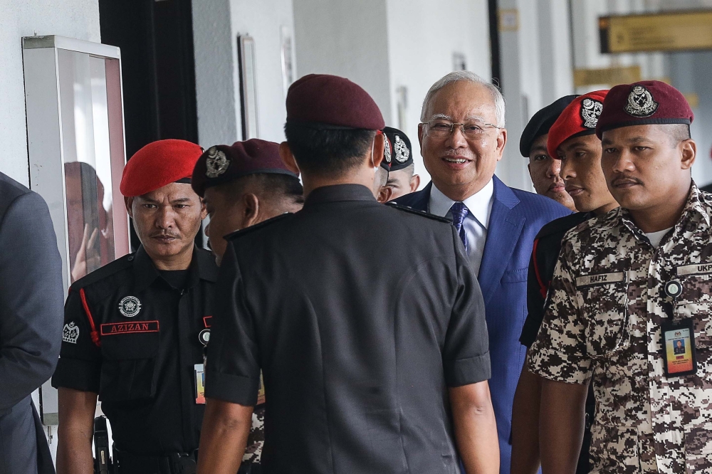 MACC investigating officer Senior Superintendent Nur Aida Arifin said her investigations showed that Datuk Seri Najib Razak had committed an offence under Section 23 where a total of more than RM3.63 billion entered his two private bank accounts (codenamed AmPrivate Banking-MR and AmPrivateBanking-1MY) and with around RM2.282 billion of that amount being the subject matter of her investigation. — Picture by Sayuti Zainudin   