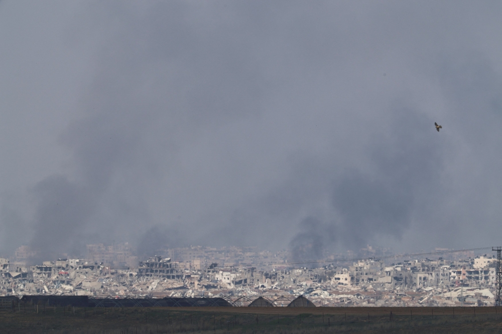 Smoke rises over Gaza, amid the ongoing conflict between Israel and the Palestinian Islamist group Hamas, as seen from southern Israel, January 2, 2024. — Reuters pic